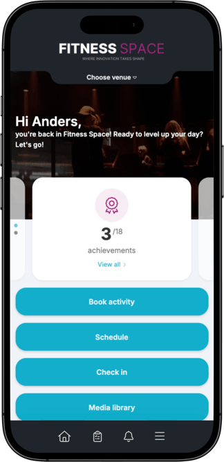 Screenshot from the Fitness Space app showing the user home screen. An achievements card is visible, with a bottom navigation bar.